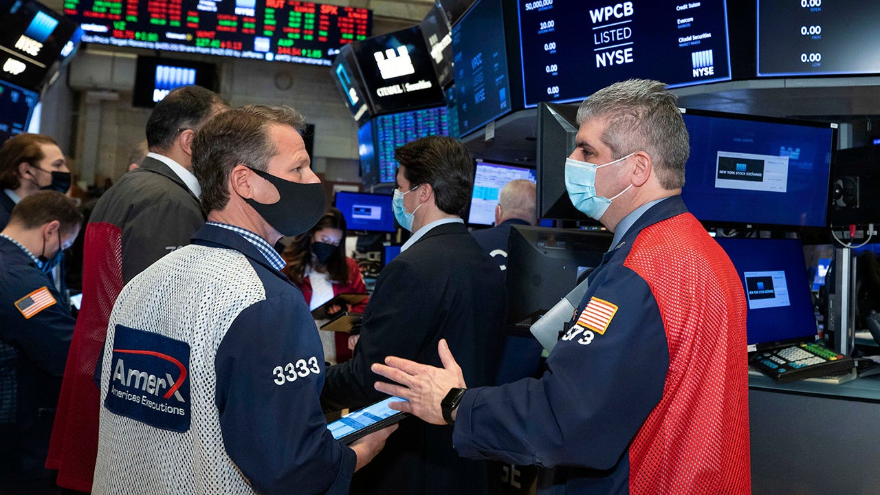 US markets lower one day after new records set - Fox Business