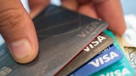 Justice Department investigating Visa over debit-card practices