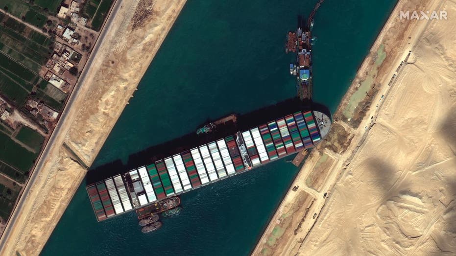 A cargo ship stuck in a canal