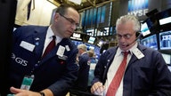 Stock futures trade lower ahead of economic data