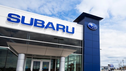 Halifax, Nova Scotia, Canada - May 6, 2012: Subaru Dealership on Kempt Road in Halifax. Brand new vehicle sits outside dealership with other vehicles visible inside showroom. Cloudy blue sky and various businesses fill the remainder of the frame. - Fox Business News