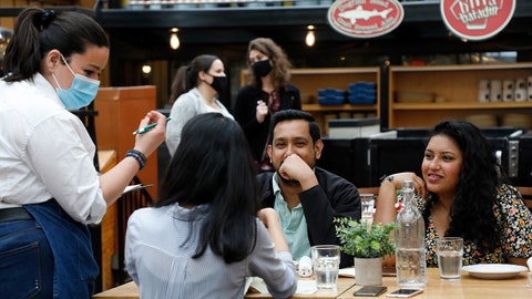 COVID-19 keeps resurging, but western economies are adapting