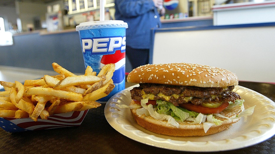 cheeseburger, fries, and a pepsi