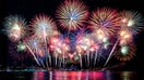 Beautiful colorful firework display over sea on celebration night. Firework festival showing on independence day or happy new year. - Fox Business News