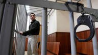 Russian court upholds 9-year sentence for US former Marine Trevor Reed