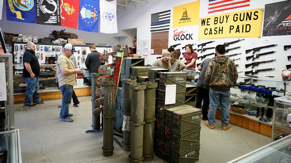 Customers in a gun store