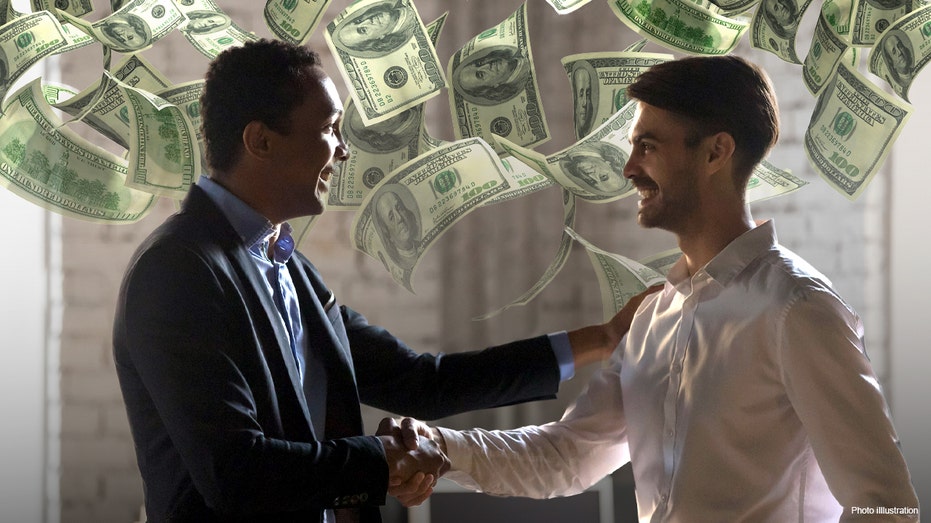 men shaking hands with money falling down