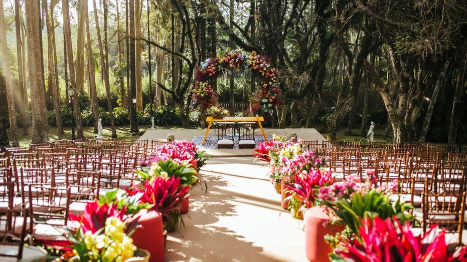 Floral wedding arch and aisle