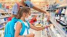 Mother and Daughter on Back To School Shopping During Coronavirus Pandemic &amp;#8211; stock photo