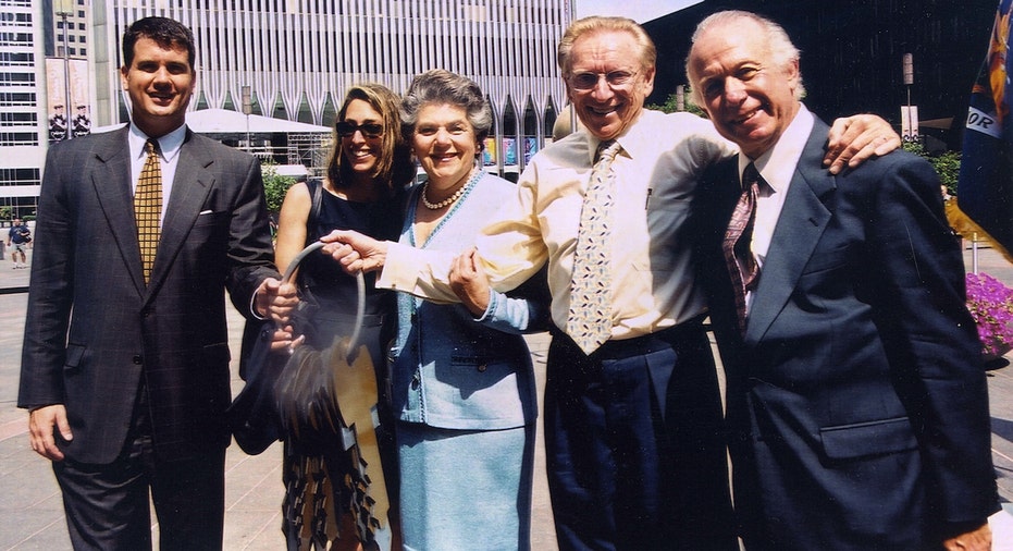 Larry Silverstein and his family pose for a photo after receiving the keys to 7 World Trade Center in 2001.