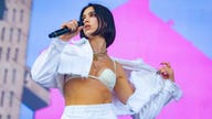 Dua Lipa rocks groovy two-piece causing it to sell out online