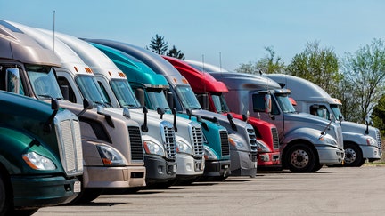 Group of trucks parked at truck stop, American transport concept, Missouri, United States. - Fox Business News
