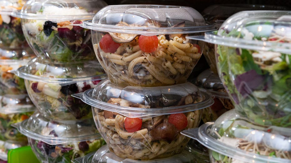 Closeup shot of tasty food in plastic containers in the shop