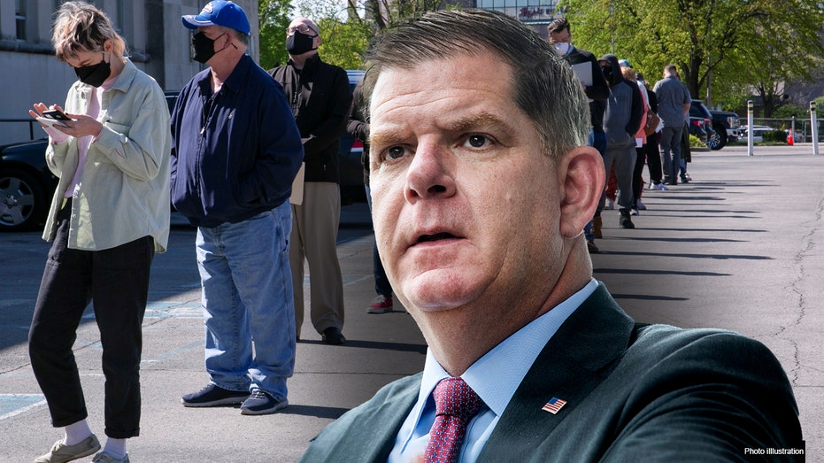 Marty Walsh next to job line