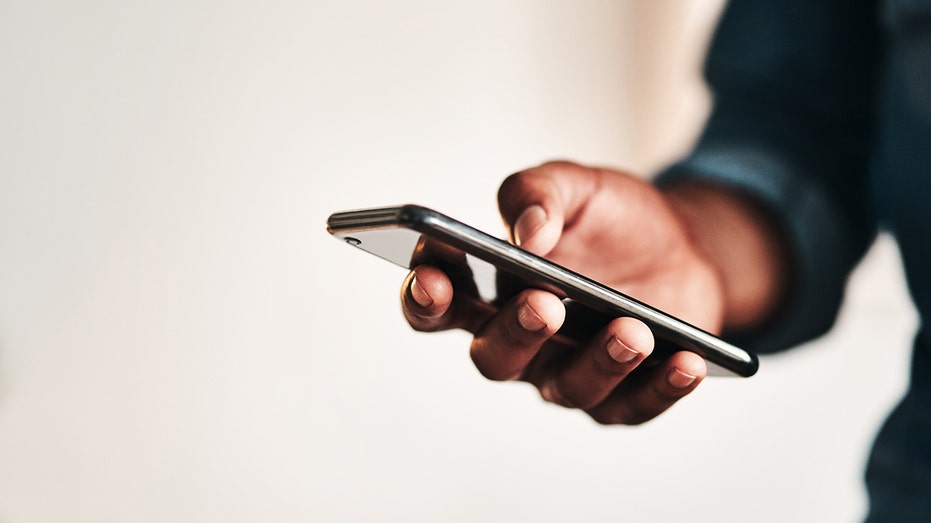 man with phone in his hand