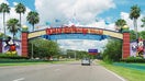 Lake Buena Vista, Florida, USA - August 19, 2015: an entrance of Walt Disney World Resort. Some cars are visible.