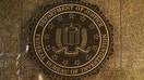  The seal of the Federal Bureau of Investigation hangs on the outside of the bureau&apos;s Edgar J. Hoover Building May 9, 2017 in Washington, DC. (Photo by Chip Somodevilla/Getty Images)