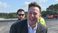 Tesla hits $1 trillion market value, Musk's net worth soars