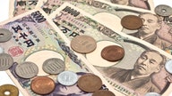 Japan intervenes in FX market to stem yen falls after BOJ keeps super-low rates