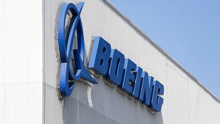 The Boeing logo is pictured at its Renton Factory, where the Boeing 737 MAX airliners are built in Renton, Washginton on April 20, 2020. - Boeing announced it will resume commercial airplane production this week at its Puget Sound-region facilities. (Photo by Jason Redmond / AFP) (Photo by JASON REDMOND/AFP via Getty Images)