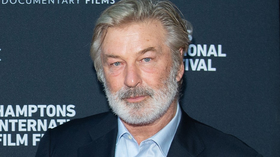 Alec Baldwin poses on the carpet at the World Premiere Of National Geographic Documentary 