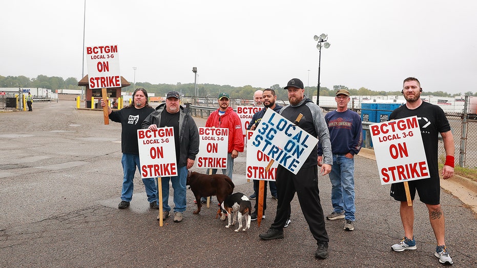 Kellogg's cereal plant workers demonstrate in front of the plant on Oct. 7, 2021, in Battle Creek, Michigan.