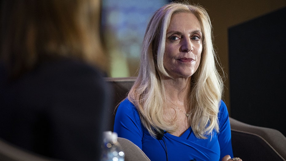 Fed Vice Chair Lael Brainard wearing blue