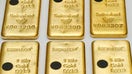 FILE PHOTO: The Sicpa Oasis validator system (bullion protect) is pictured on one kilogram bar of gold at Swiss refiner Metalor in Marin near Neuchatel, Switzerland July 5, 2019. REUTERS/Denis Balibouse/File Photo