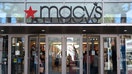 Shoppers exit a Macy&apos;s department store in Las Vegas, Nevada, on Sunday, Nov. 7, 2021. 