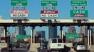 JERSEY CITY, NJ - AUG 29: Cars pass through a toll plaza on the New Jersey Turnpike on August 29, 2019 in Jersey City, New Jersey. (Photo by Gary Hershorn/Getty Images)