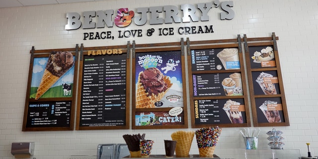 The menu hangs on the wall of a Ben & Jerry's Ice Cream Shop on September 23, 2021 in Miami, Florida.  (Photo by Joe Raedle/Getty Images)