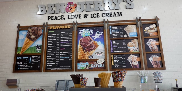 The menu hangs on the wall at a Ben &amp; Jerry's ice cream store on September 23, 2021 in Miami, Florida. (Photo by Joe Raedle/Getty Images)