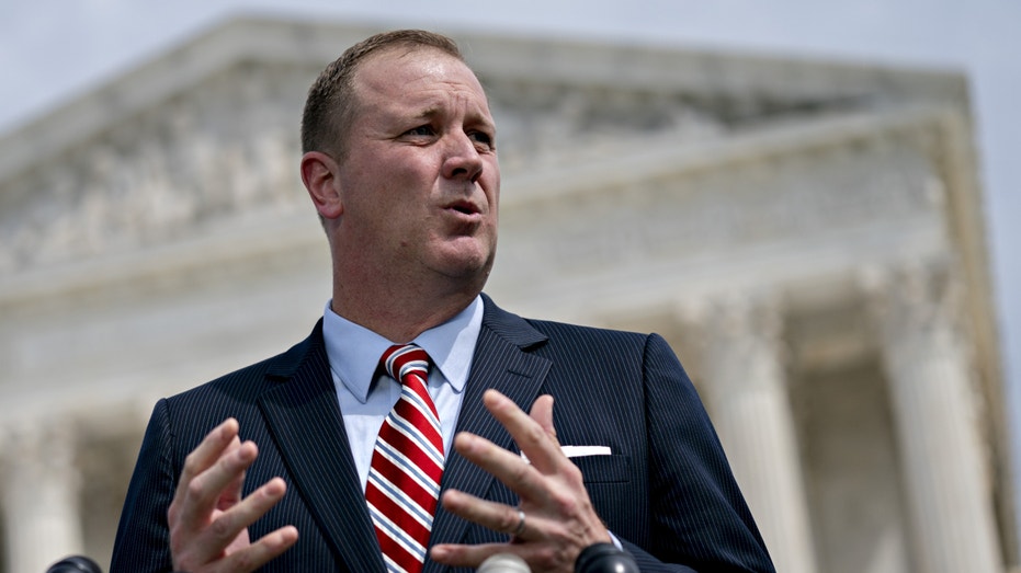 Eric Schmitt, Missouri attorney general, speaks during a news conference outside the Supreme Court in Washington, D.C., U.S., on Monday, Sept. 9, 2019. A group of 50 attorneys general opened a broad investigation into whether advertising practices of Alphabet Inc.'s Google violate antitrust laws. Photographer: Andrew Harrer/Bloomberg