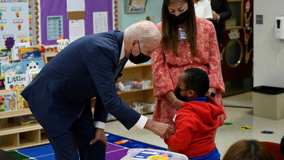 US president Joe Biden talks to students during a visit to a pre-k classroom at East End elementary school in North Plainfield, New Jersey to promote his build back better agenda on October 25, 2021. (Photo by ANDREW CABALLERO-REYNOLDS / AFP) (Photo by ANDREW CABALLERO-REYNOLDS/AFP via Getty Images)