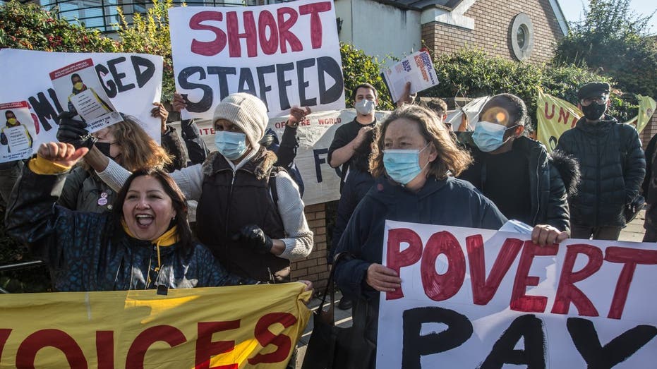 Striking workers stage a picket