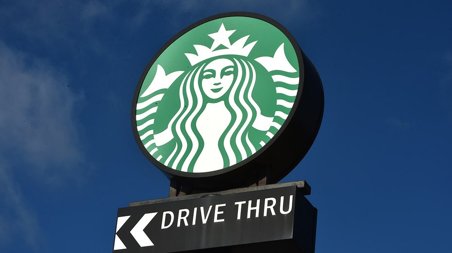 Starbucks store sign with drive-thru sign