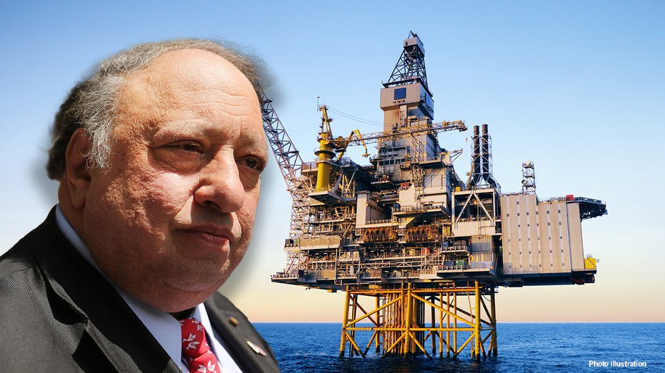 John Catsimatidis next to oil rig