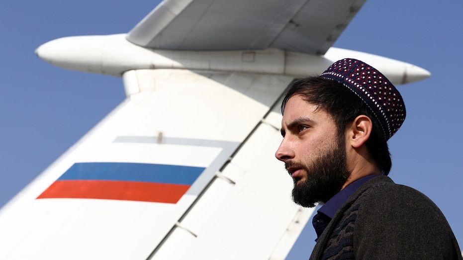 A member of the Taliban movement (banned in Russia), seen near an Ilyushin Il-76 airlifter of the Russian Aerospace Forces that has delivered humanitarian aid, at Kabul airport.