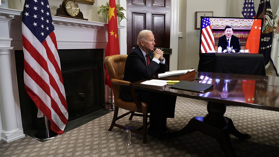 US President Biden attends a virtual meeting with Chinese President Xi Jinping in the Roosevelt Room of the White House on November 15, 2021 in Washington, D.C. 