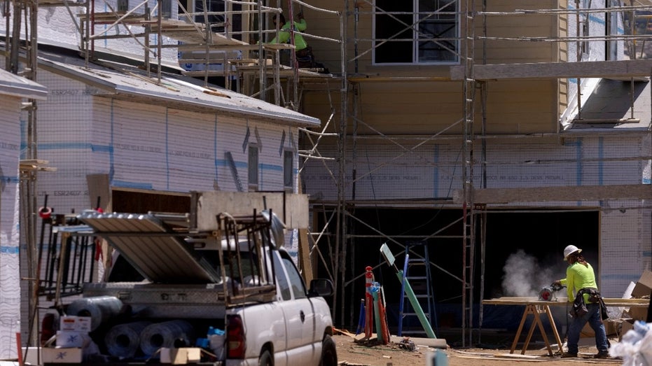 Residential single family homes construction by KB Home are shown under construction in the community of Valley Center, California