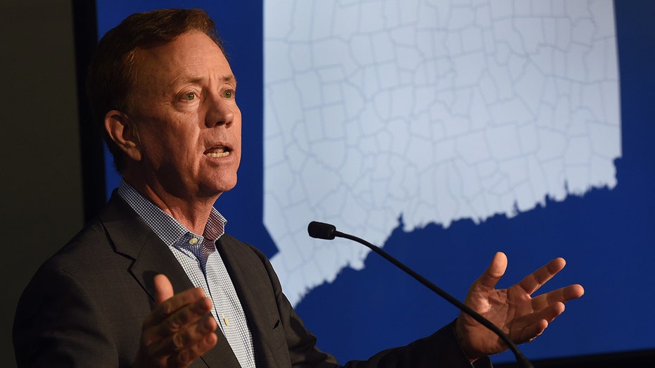 Connecticut Gov. Ned Lamont speaks at a press conference at the UConn School of Business Graduate Learning Center in Hartford, Connecticut, on Tuesday, Jan. 13, 2020.