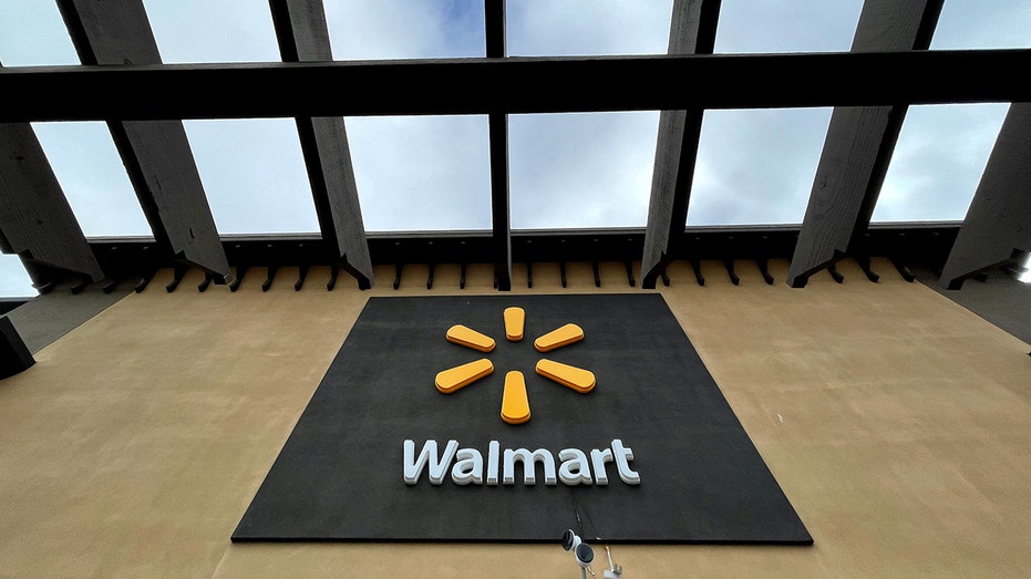 A sign is posted in front of a Walmart store on Nov. 16, 2021, in American Canyon, California. 