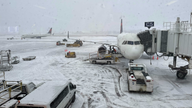 Midwest winter storm forces airlines to cancel hundreds of flights with foot of snow expected in some areas