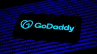 GoDaddy says servers were attacked by hackers that stole code and installed malware