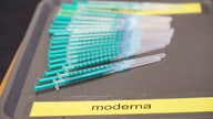 Moderna says COVID-19 booster dose works against omicron variant in lab tests