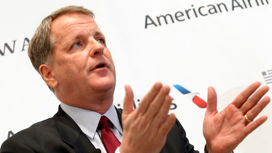 Doug Parker announces the planned merger of AMR Corp., the parent of American Airlines, with U.S. Airways, during a news conference at Dallas-Fort Worth International Airport, Feb. 14, 2013.