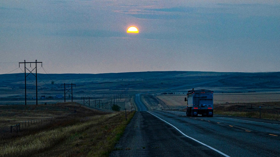 North America, USA, Montana, Wolf Point. Sunrise in Forest Fire Smoke. (Photo by: Bernard Friel/Education Images/Universal Images Group via Getty Images)