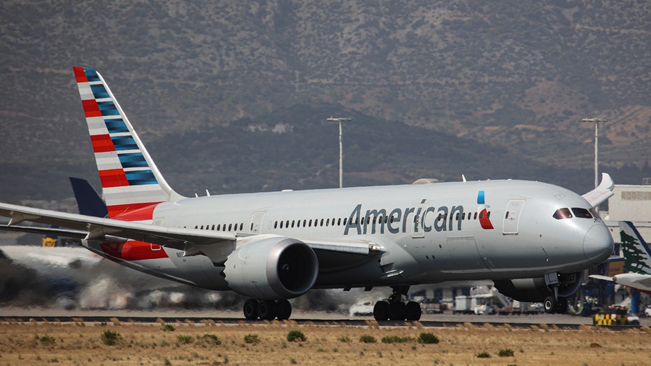 American Airlines Boeing 787 Dreamliner aircraft departs at takeoff and flying phase from Athens International Airport ATH LGAV near the Greek capital.