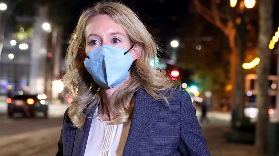 Theranos founder and former CEO Elizabeth Holmes leaves the Robert F. Peckham Federal Building on Dec. 17, 2021, in San Jose, California.