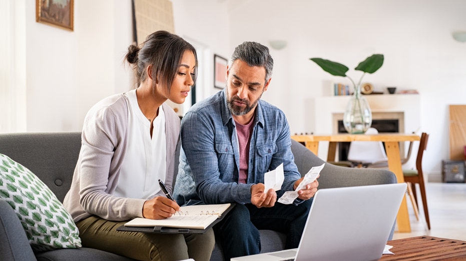 Two people going over finances 